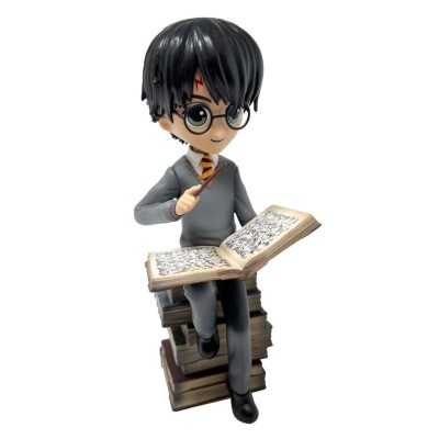 PLASTOY HARRY POTTER ON PILE OF SPELL FIGURE STATUE